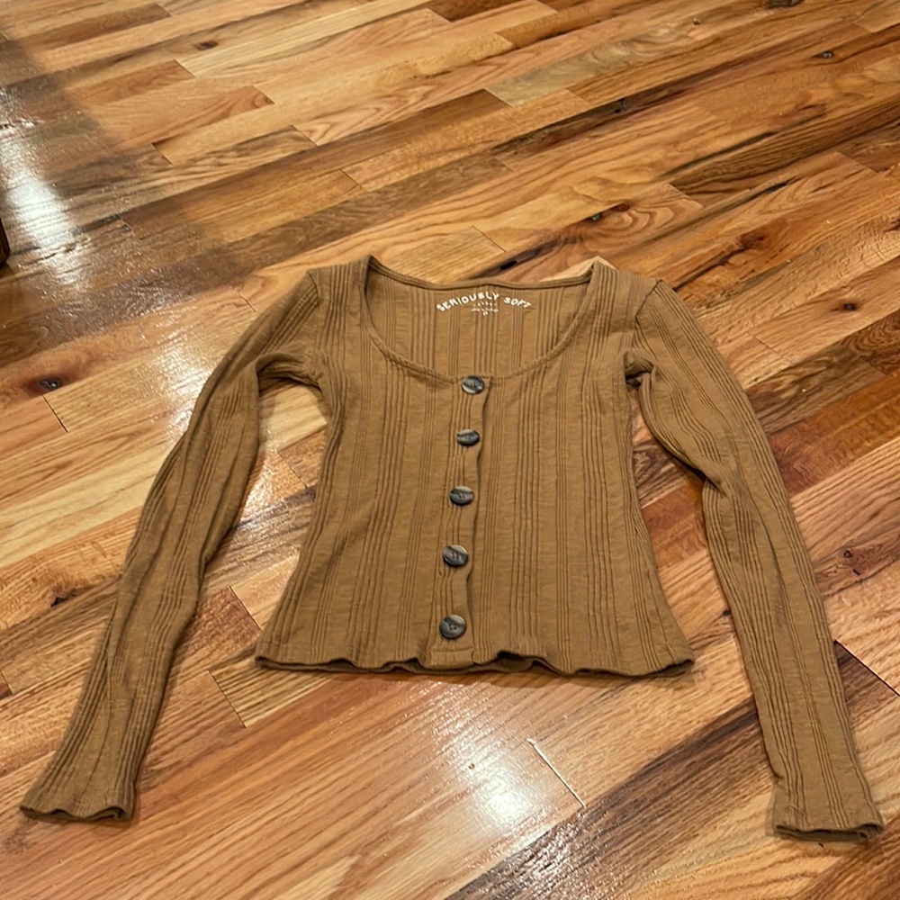 Long sleeve shirt with decorative buttons